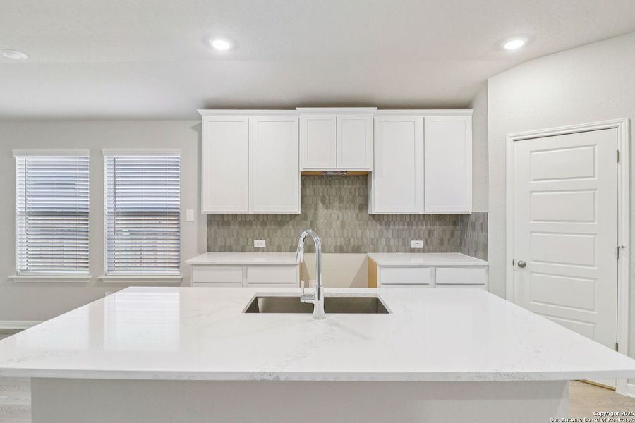 Furnished interior view inside a new home in Estancia Ranch - Premier Series, San Antonio (Image 14).