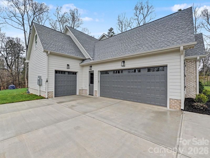 Front exterior of a new home in , Clover, SC, highlighting curb appeal (Image 26).