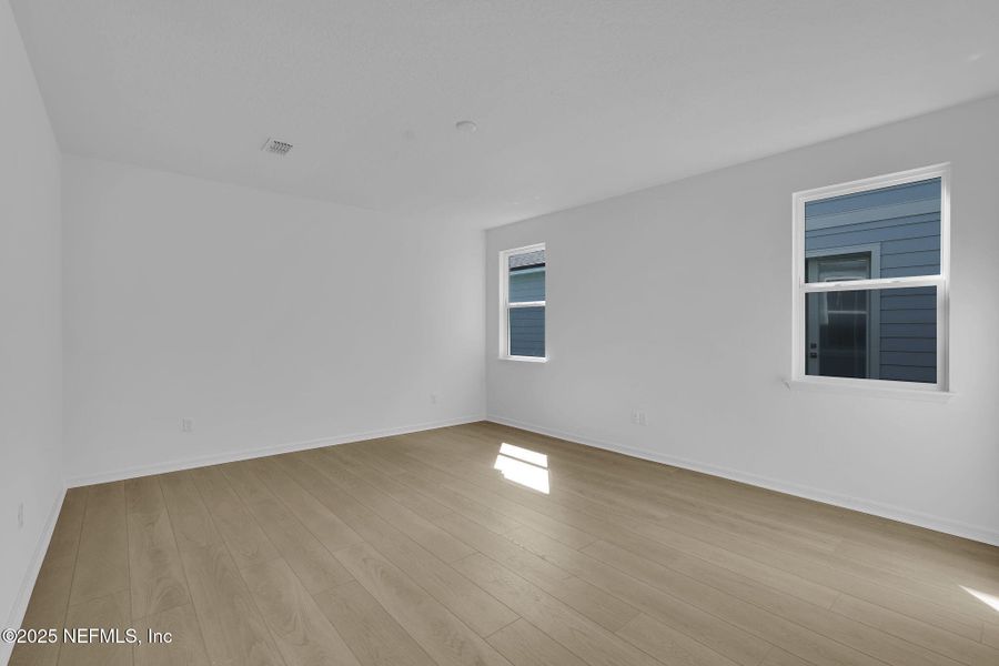 Spacious, unfurnished interior of a new home in Hawthorn Park at Wildlight, Yulee (Image 21).