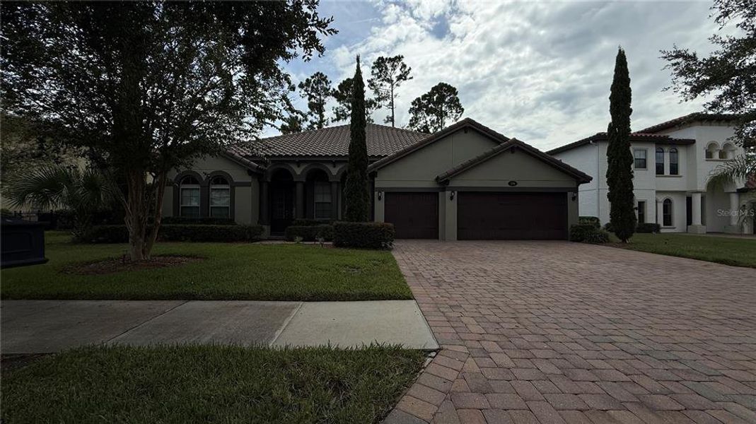 Front exterior of a new home in , Debary, FL, highlighting curb appeal (Image 1). Front exterior of a new home in , Debary, FL, highlighting curb appeal (Image 1).