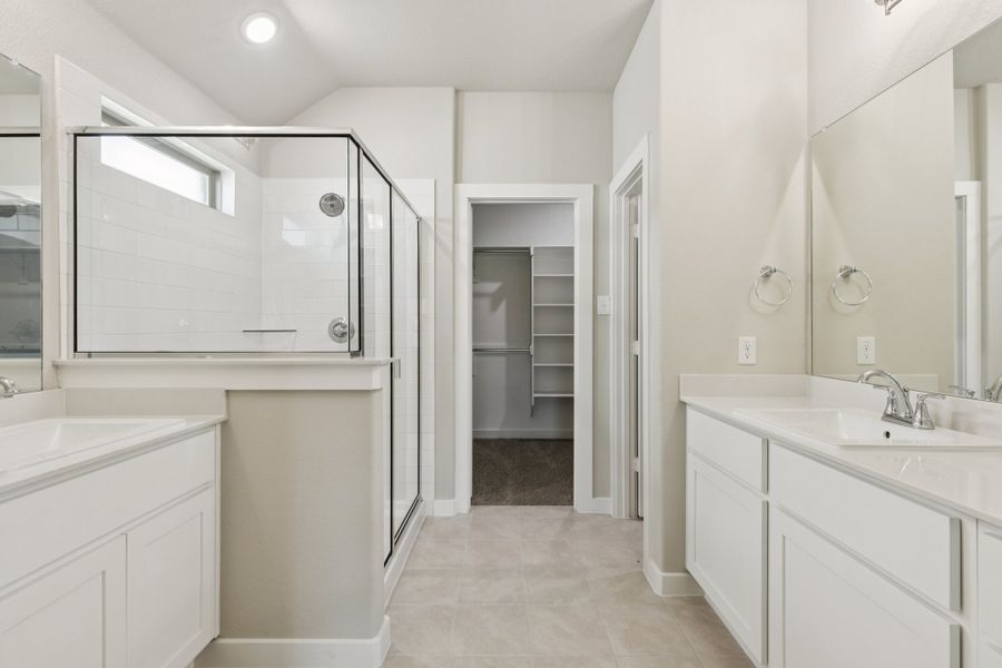 Primary Bathroom in the Heisman home plan by Trophy Signature Homes – REPRESENTATIVE PHOTO Primary Bathroom in the Heisman home plan by Trophy Signature Homes – REPRESENTATIVE PHOTO