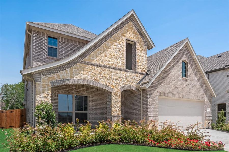 Front exterior of a new home in Mercer Meadows, Royse City, TX, highlighting curb appeal (Image 2).