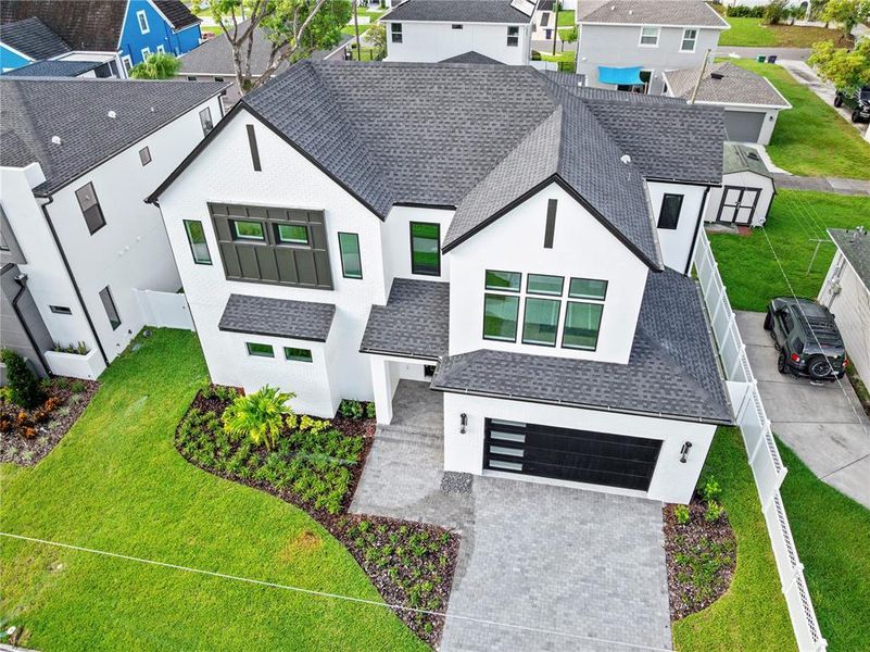 Front exterior of a new home in , Tampa, FL, highlighting curb appeal (Image 2).