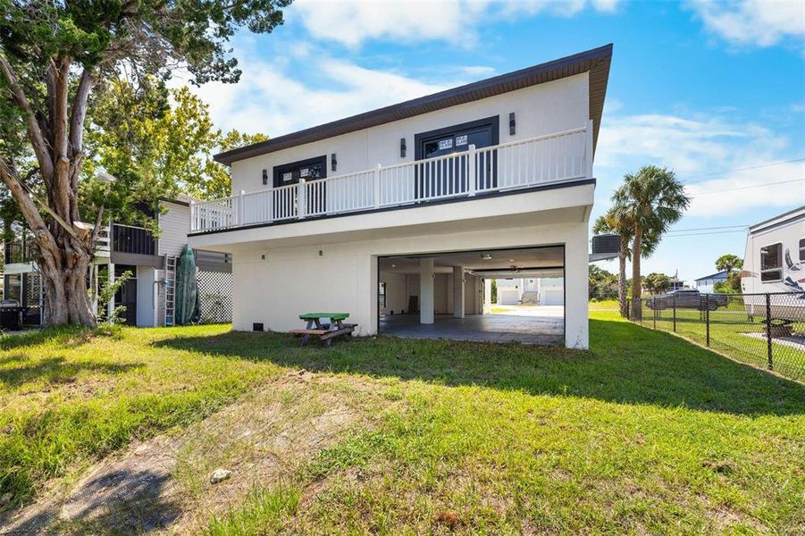 Front exterior of a new home in , Hernando Beach, FL, highlighting curb appeal (Image 2).