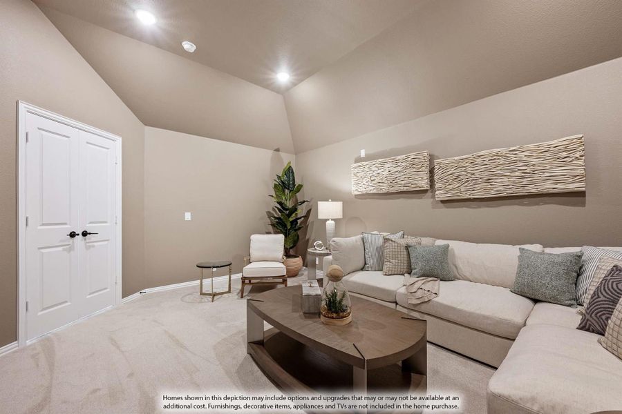 Living room with vaulted ceiling, sectional sofa, wood coffee table, and carpet flooring