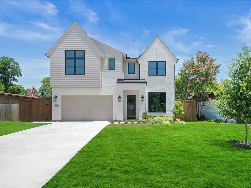 Front exterior of a new home in , Dallas, TX, highlighting curb appeal (Image 1). Front exterior of a new home in , Dallas, TX, highlighting curb appeal (Image 1).