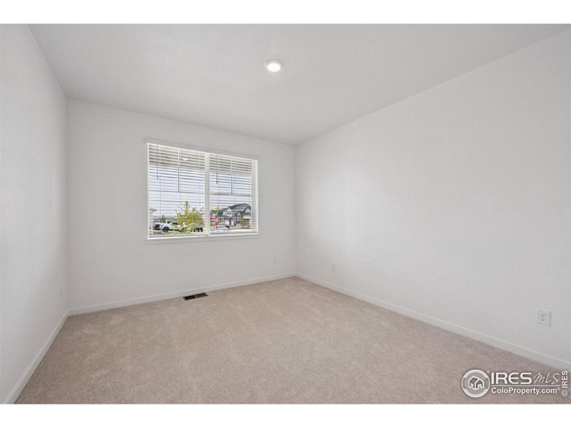 Spacious, unfurnished interior of a new home in Hansen Farm, Fort Collins (Image 32).