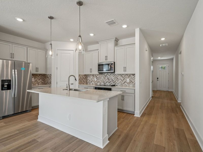 Furnished interior view inside a new home in Ridgehaven - Signature Series, Ormond Beach (Image 3).