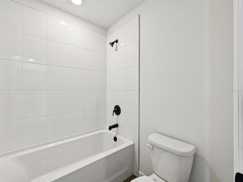 Furnished interior view inside a new home in Oakfield Trails - Signature Series, Parrish (Image 14).