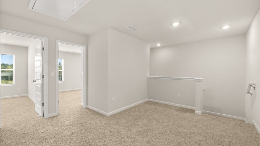 Representative unfurnished interior of a home built from the Ashton by D.R. Horton in Brookland Commons, Monroe (Image 21).