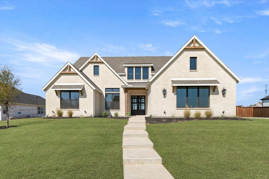 Representative exterior photo of a completed home built from the Carleigh by Our Country Homes in Enchanted Creek, Lucas, TX (Image 7).