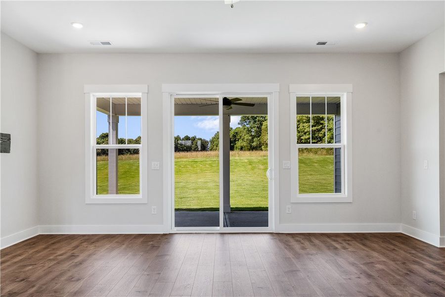 Natural light floods this living space, highlighti
