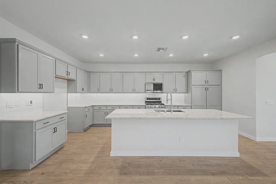 Furnished interior view inside a new home in Avanti at Granite Vista, Waddell (Image 7).