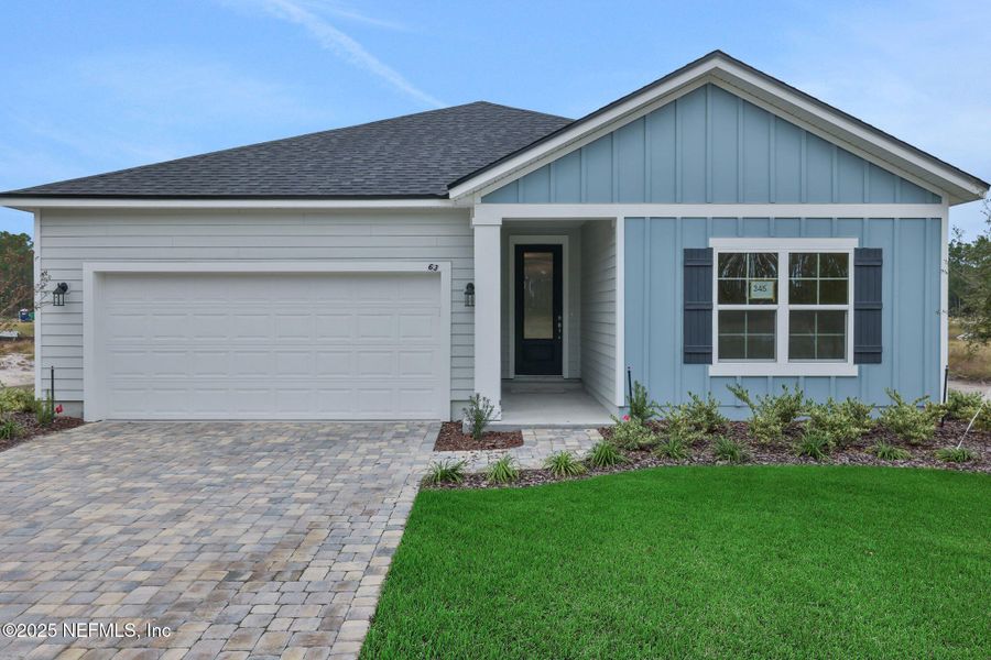 Front exterior of a new home in Brook Forest - Single Family Homes, St. Augustine, FL, highlighting curb appeal (Image 23). Front exterior of a new home in Brook Forest - Single Family Homes, St. Augustine, FL, highlighting curb appeal (Image 23).