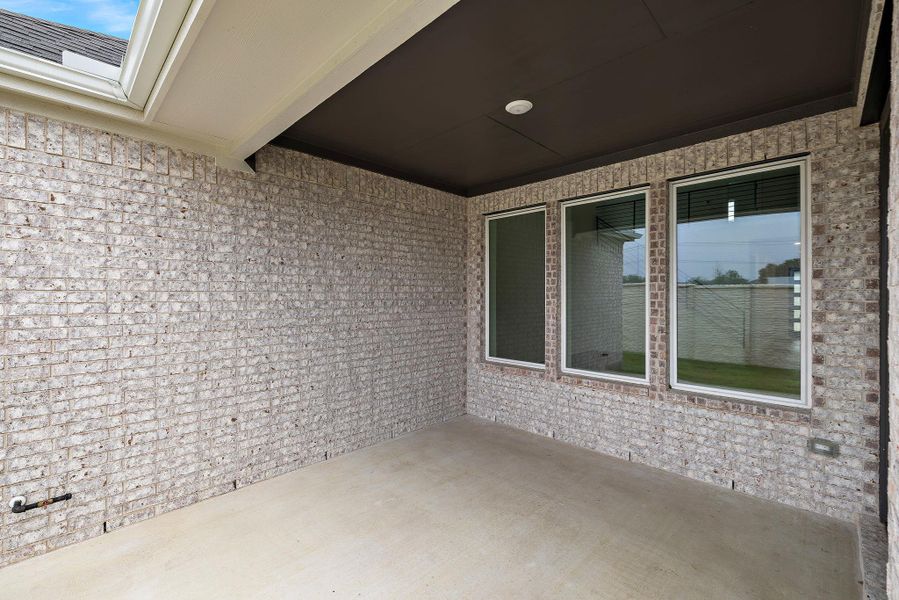 Exterior details and patio area of a home in Blackhawk in Pflugerville, Pflugerville (Image 4).