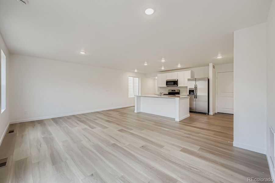 Spacious, unfurnished interior of a new home in Preserve at Mesa Creek: The Celestial Collection, Colorado Springs (Image 6).