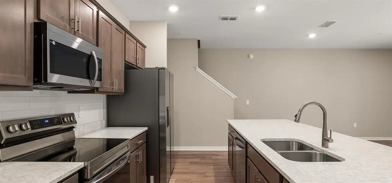 Furnished interior view inside a new home in , St. Cloud (Image 11).