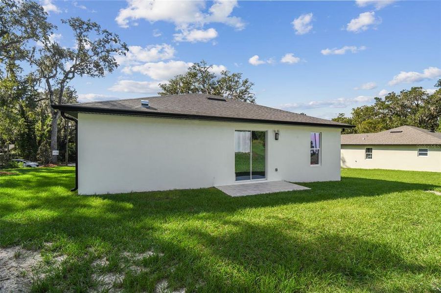 Exterior details and patio area of a home in , Brooksville (Image 30).