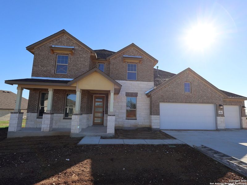 Front exterior of a new home in Preserve at Annabelle Ranch, San Antonio, TX, highlighting curb appeal (Image 2). Front exterior of a new home in Preserve at Annabelle Ranch, San Antonio, TX, highlighting curb appeal (Image 2).