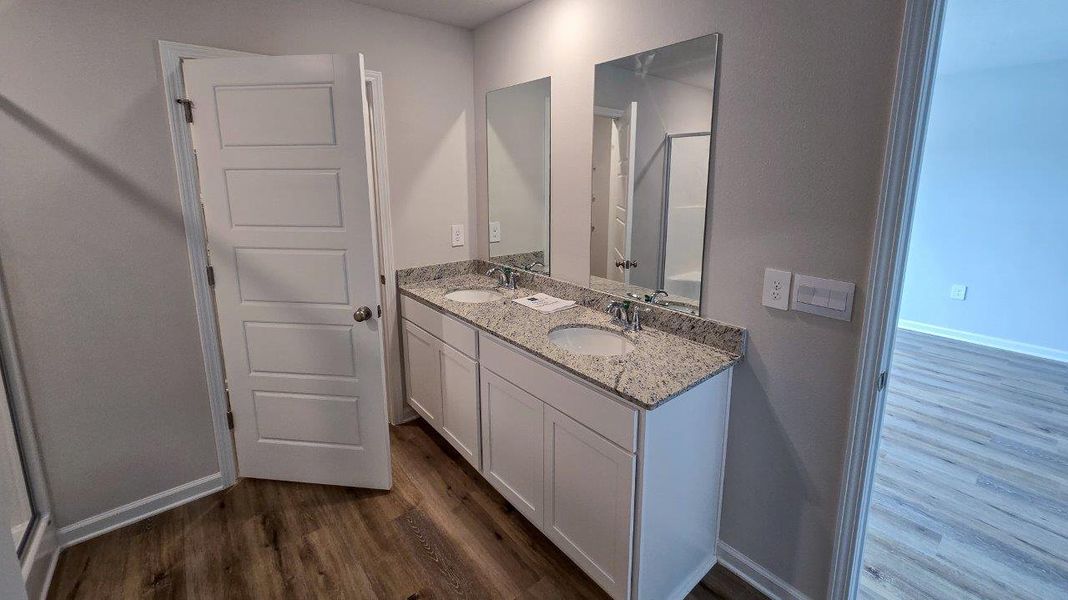 Furnished interior view inside a new home in Lake Mary Forest, Tallahassee (Image 9).