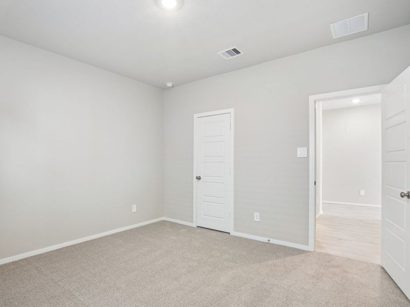 Spacious, unfurnished interior of a new home in Riviera Pines - Classic Series, Conroe (Image 13).