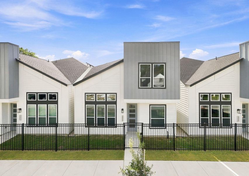 Contemporary two-story design with distinctive architectural lines, contrasting finishes, large windows, and a fenced front yard. Contemporary two-story design with distinctive architectural lines, contrasting finishes, large windows, and a fenced front yard.