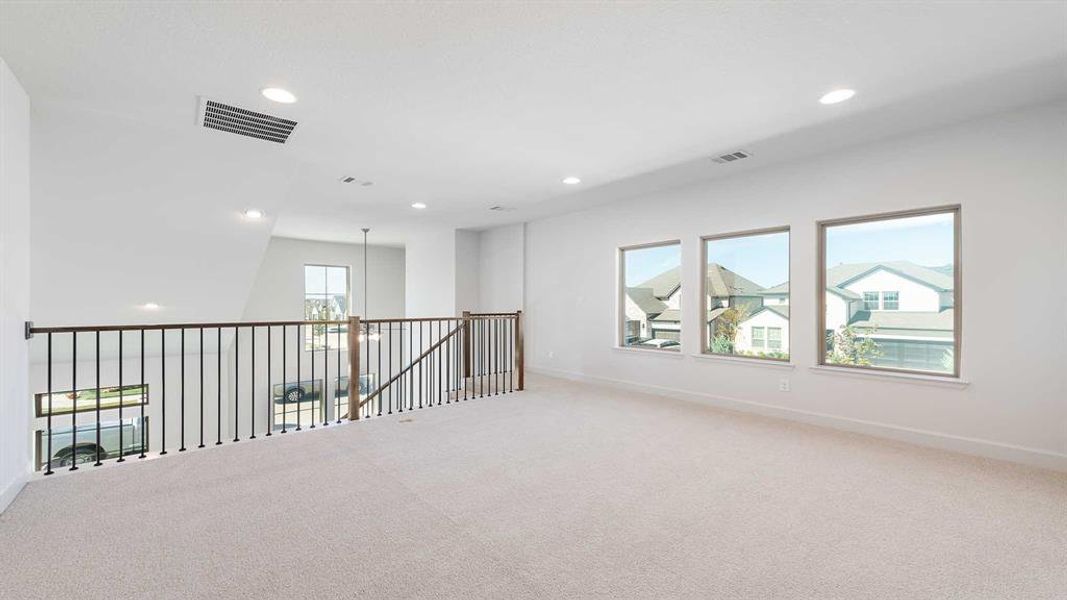 Spacious, unfurnished interior of a new home in The Parks At Wilson Creek 40', Celina (Image 21).