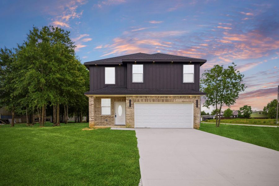 Front exterior of a new home in , Cleveland, TX, highlighting curb appeal (Image 34). Front exterior of a new home in , Cleveland, TX, highlighting curb appeal (Image 34).