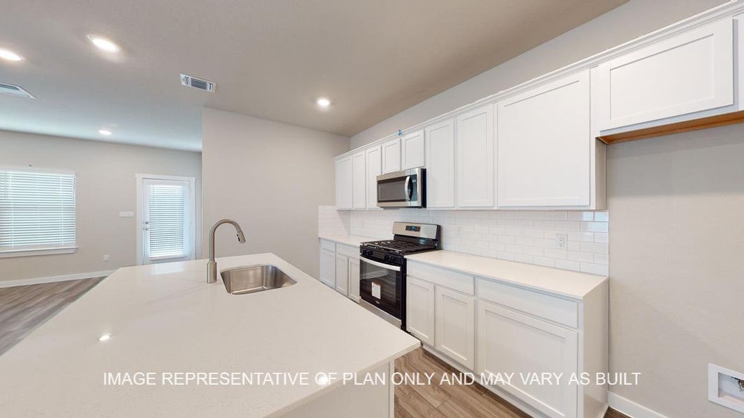 Representative furnished interior of a home built from the Caden by D.R. Horton in Yowell Ranch, Killeen (Image 5).