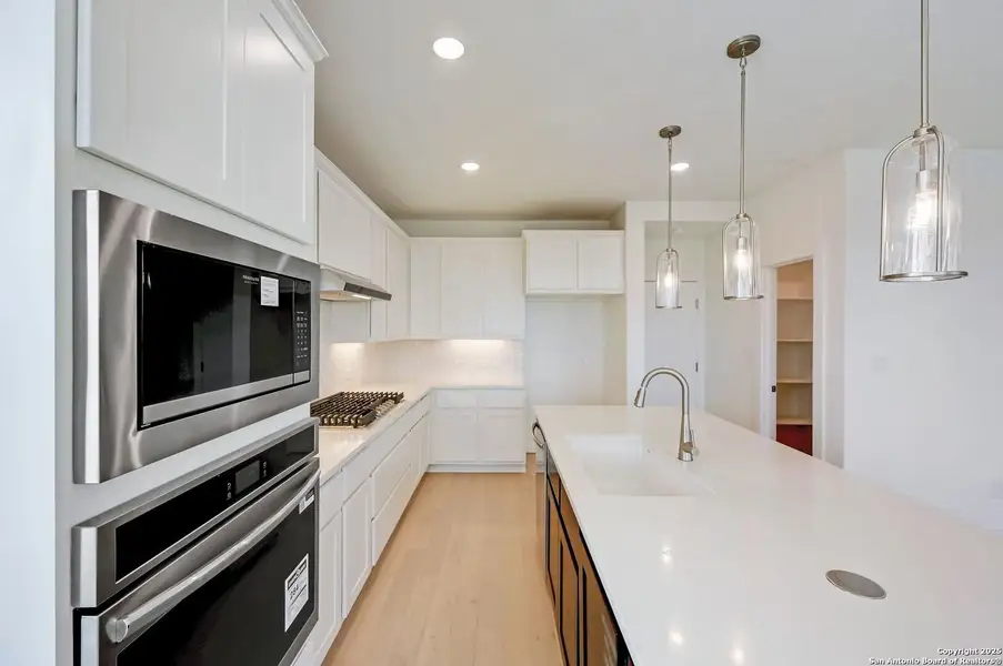 Furnished interior in a model home at Legacy at Lake Dunlap in New Braunfels (Image 14). Furnished interior in a model home at Legacy at Lake Dunlap in New Braunfels (Image 14).