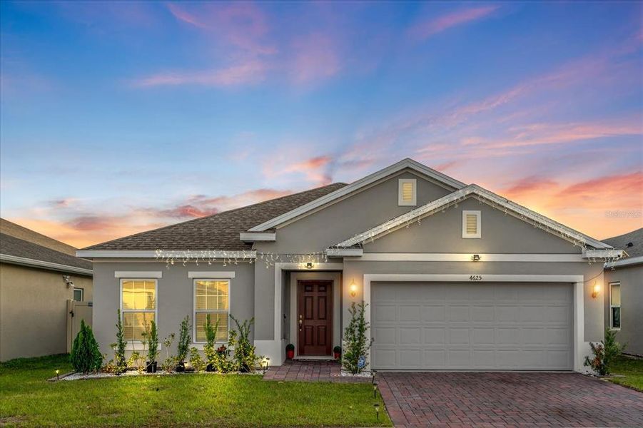 Front exterior of a new home in Hammock Reserve, Haines City, FL, highlighting curb appeal (Image 20).