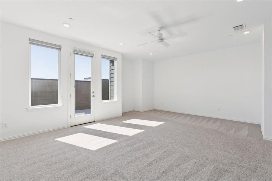 Unfurnished room with light colored carpet, recessed lighting, and ceiling fan Unfurnished room with light colored carpet, recessed lighting, and ceiling fan