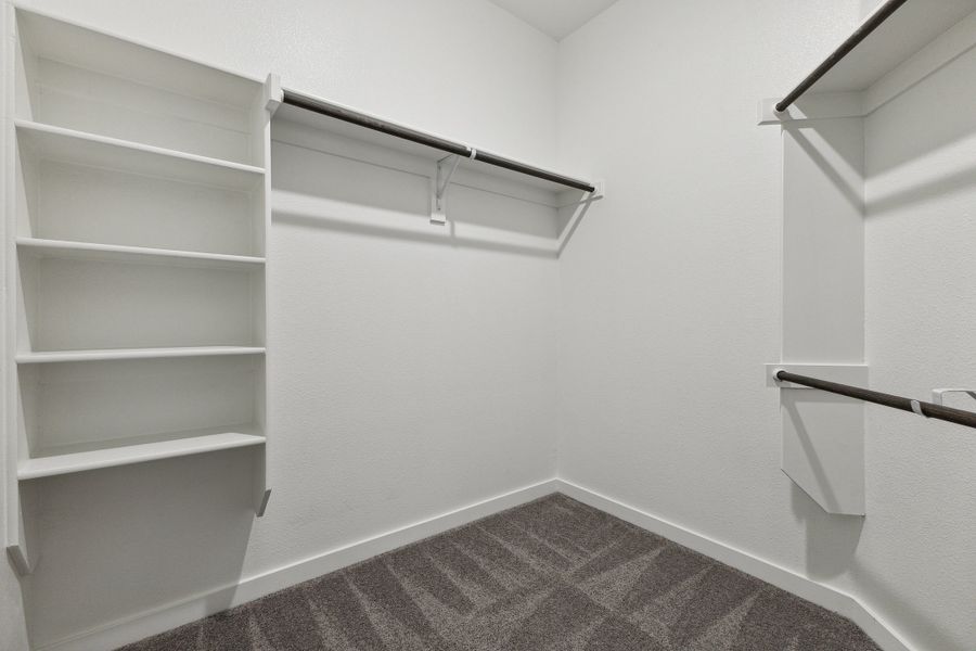 Primary Closet in the Amber home plan by Trophy Signature Homes – REPRESENTATIVE PHOTO