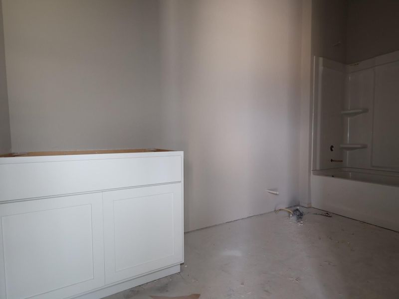 In-progress construction of a new home in Carillon, Manor, TX (Image 12).