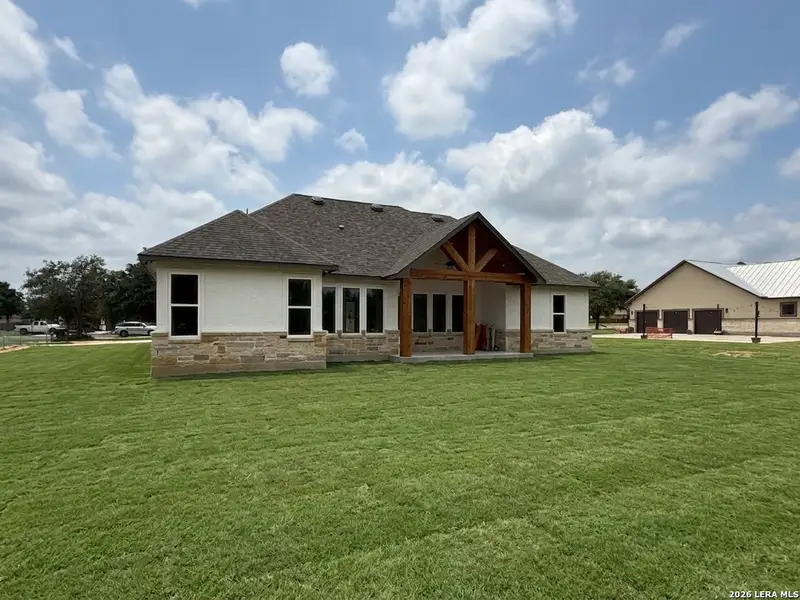 Exterior details and patio area of a home in , Lytle (Image 3).