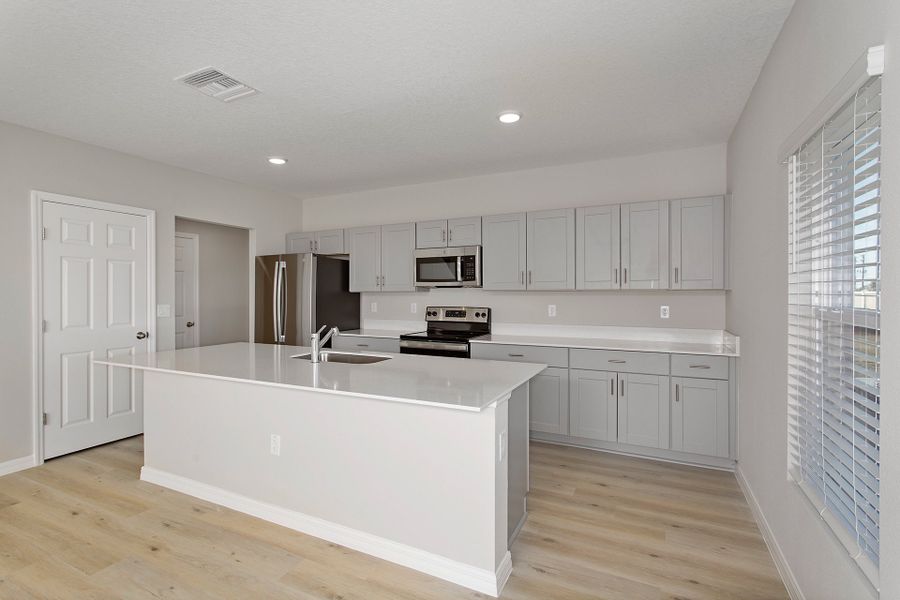 Furnished interior view inside a new home in Two Rivers, Zephyrhills (Image 6).