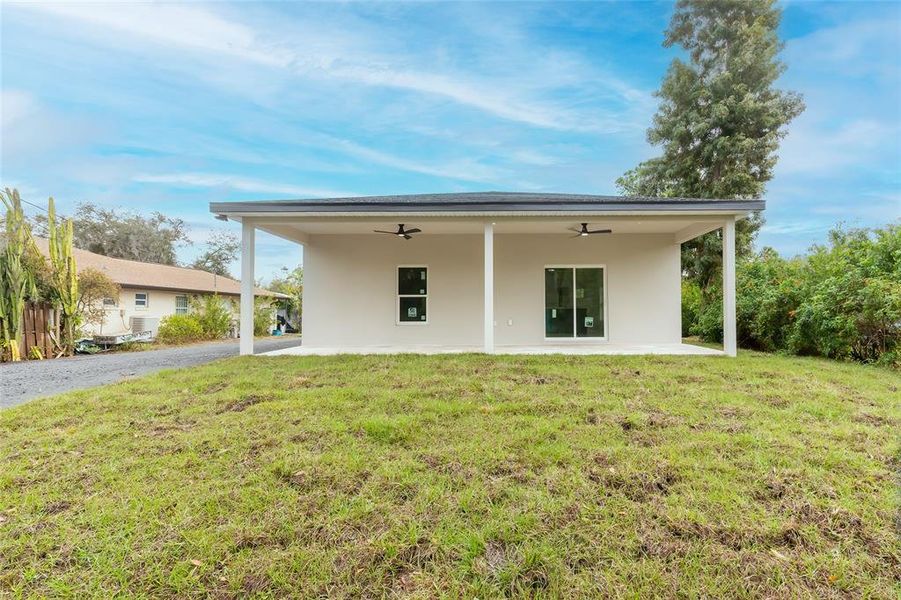 Exterior details and patio area of a home in , Sebring (Image 25).