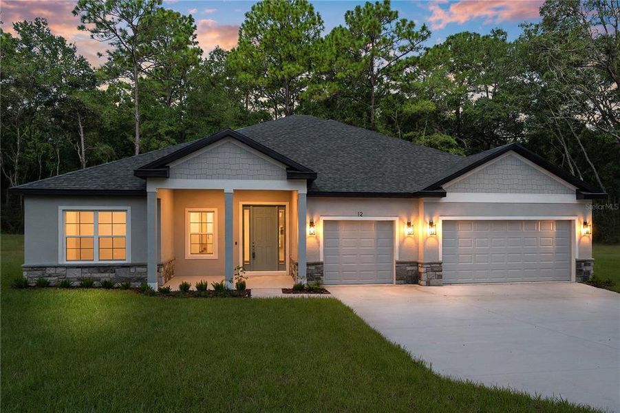 Front exterior of a new home in , Lecanto, FL, highlighting curb appeal (Image 27). Front exterior of a new home in , Lecanto, FL, highlighting curb appeal (Image 27).