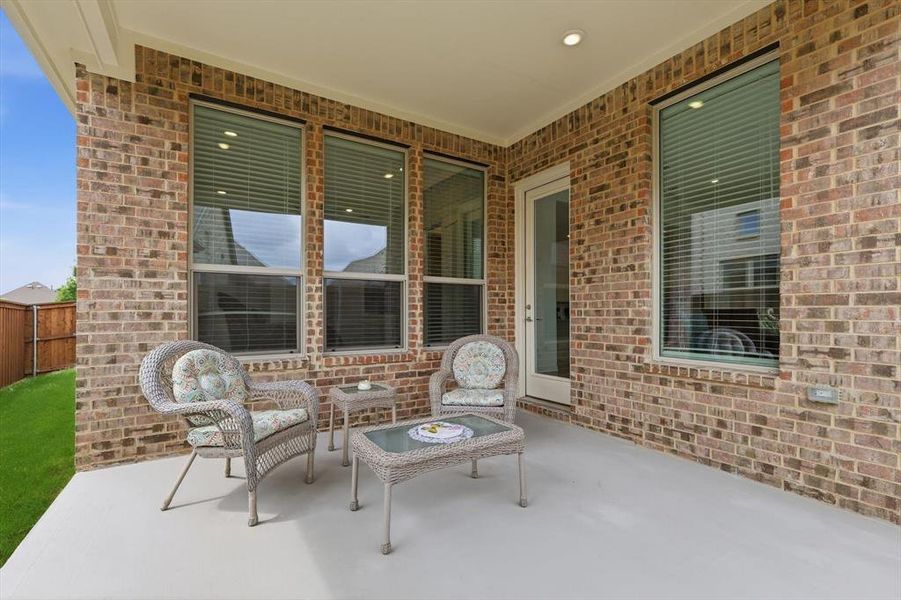 Exterior details and patio area of a home in Elements at Viridian | Active Adult 55+, Arlington (Image 19).