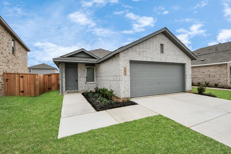 Front exterior of a new home in Anniston, Katy, TX, highlighting curb appeal (Image 20). Front exterior of a new home in Anniston, Katy, TX, highlighting curb appeal (Image 20).