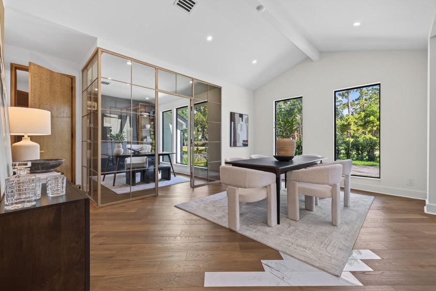 Light-filled dining space offers a sophisticated setting for formal or casual entertaining.