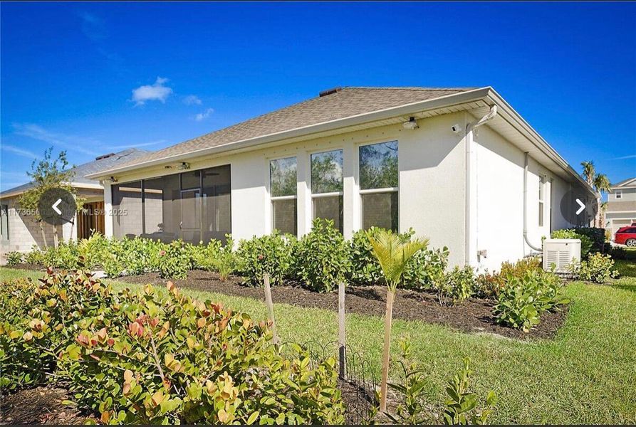 Front exterior of a new home in , Port St. Lucie, FL, highlighting curb appeal (Image 2).