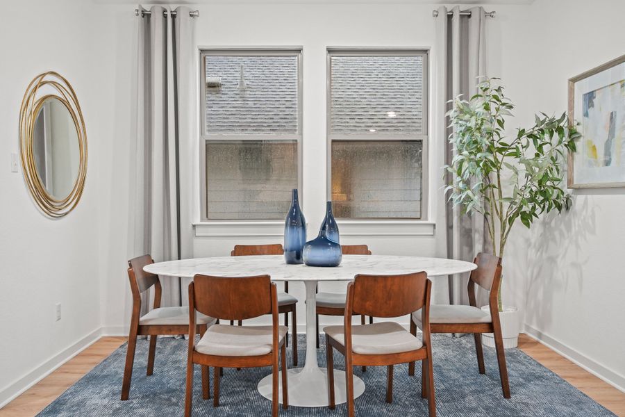 Dining Room in a Trinity Ranch Oak Model home in Elgin TX by Trophy Signature Homes