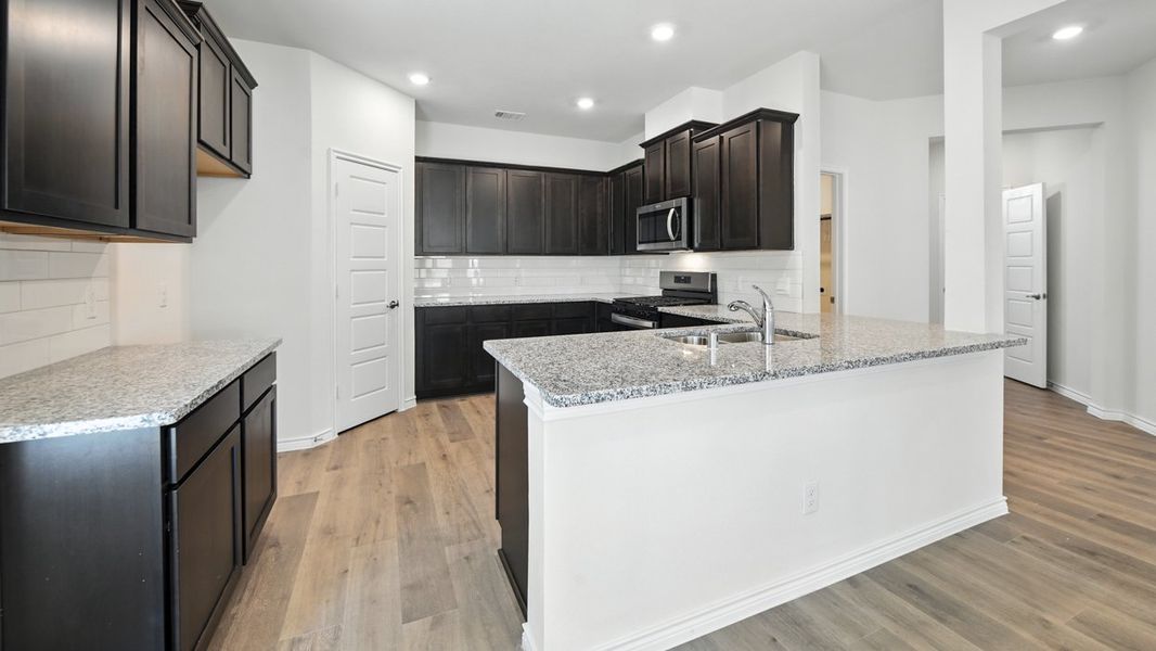 Representative furnished interior of a home built from the Amethyst by D.R. Horton in Bel Air Village, Sherman (Image 4). Representative furnished interior of a home built from the Amethyst by D.R. Horton in Bel Air Village, Sherman (Image 4).