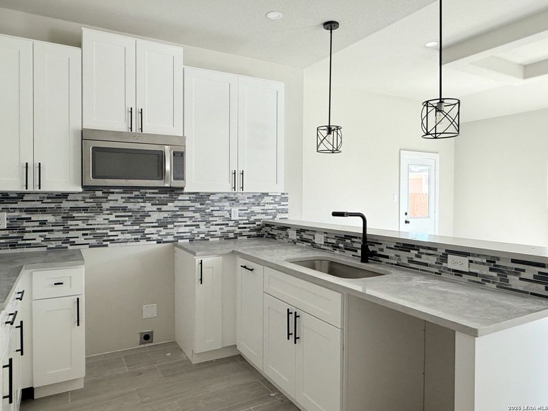 Furnished interior view inside a new home in , San Antonio (Image 7).