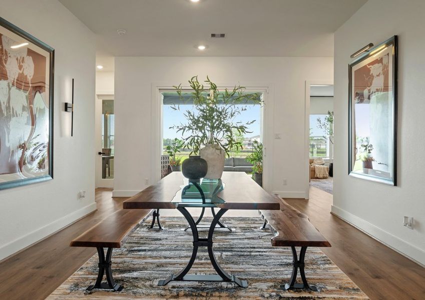 The dining area is located off the kitchen with access to the covered patio. The dining area is located off the kitchen with access to the covered patio.
