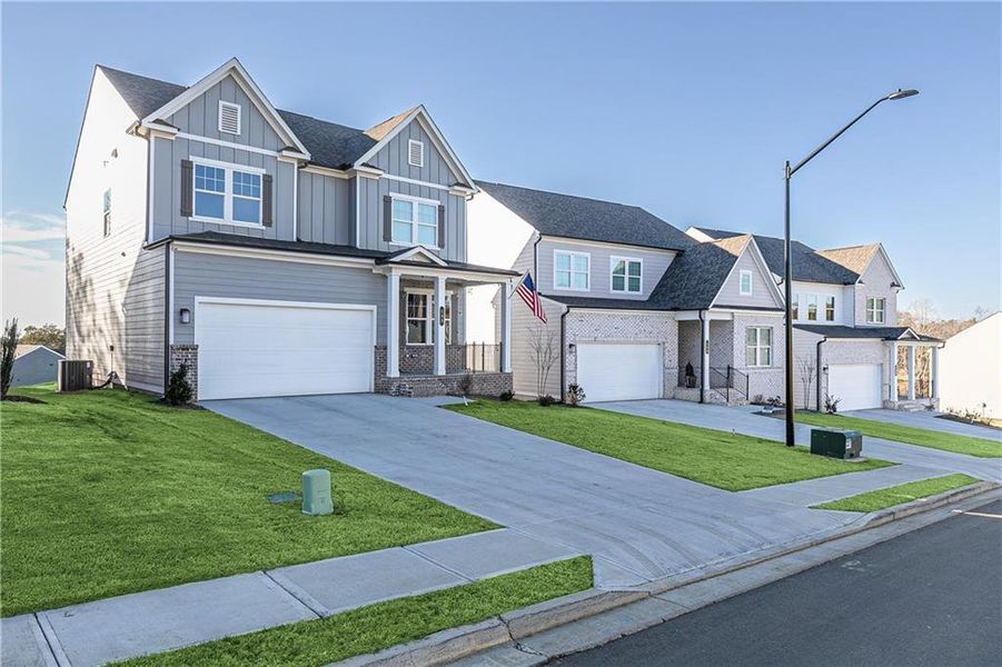 Front exterior of a new home in Kingsley, Acworth, GA, highlighting curb appeal (Image 20).