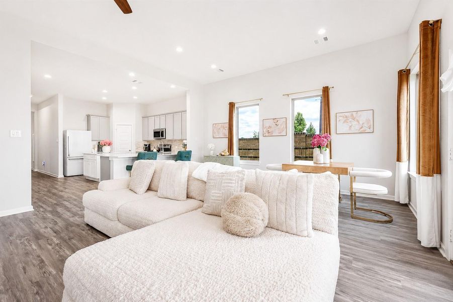Bright and airy open-concept living space, large windows letting in plenty of natural light. The room has an elegant neutral color scheme, creating a welcoming and stylish atmosphere. Bright and airy open-concept living space, large windows letting in plenty of natural light. The room has an elegant neutral color scheme, creating a welcoming and stylish atmosphere.