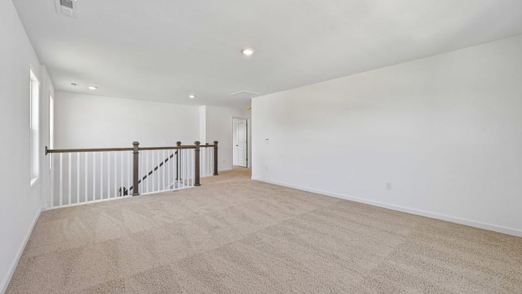 Spacious, unfurnished interior of a new home in Eagle Creek, Fuquay Varina (Image 25).