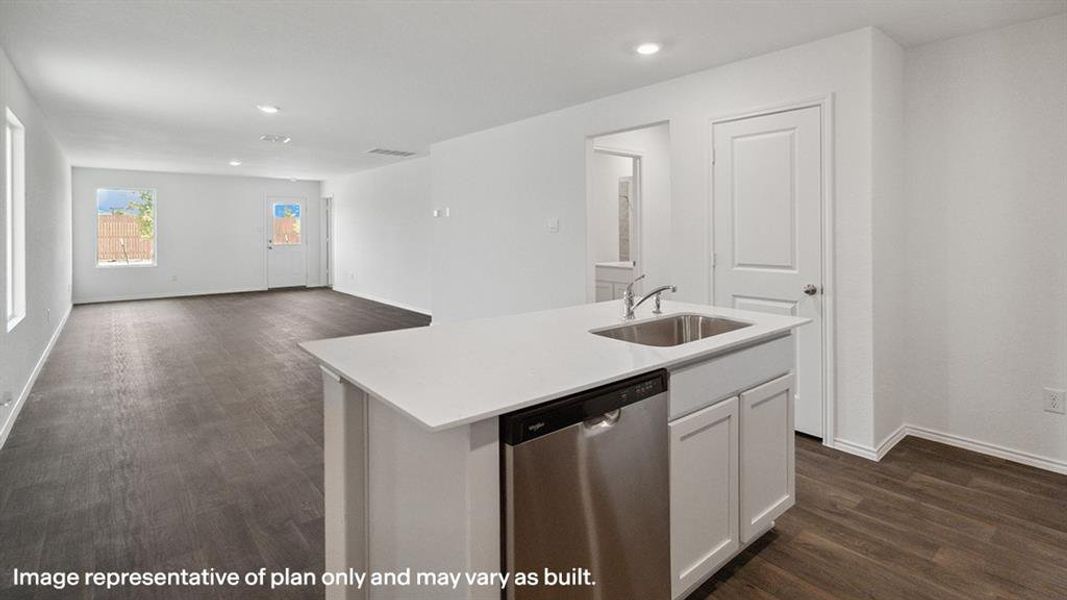 Kitchen with dishwasher, white cabinetry, dark wood-type flooring, a center island with sink, and recessed lighting